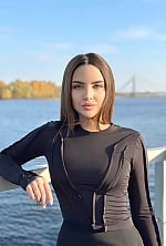 Ukrainian mail order bride Karina from Kyiv with light brown hair and green eye color - image 9