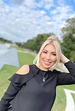 Ukrainian mail order bride Mariia from Munich with blonde hair and green eye color - image 4