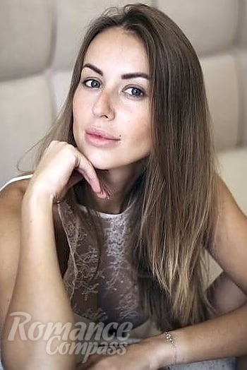 Ukrainian mail order bride Anna from Kyiv with light brown hair and blue eye color - image 1