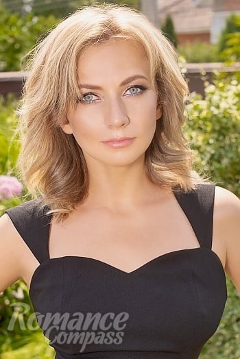 Ukrainian mail order bride Lyudmila from Kyiv with blonde hair and blue eye color - image 1