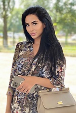 Ukrainian mail order bride Alina from Kyiv with black hair and hazel eye color - image 8