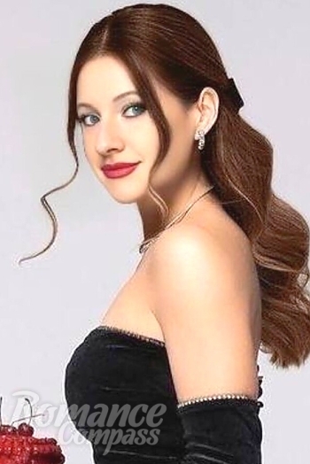 Ukrainian mail order bride Svitlana from Odesa with red hair and blue eye color - image 1
