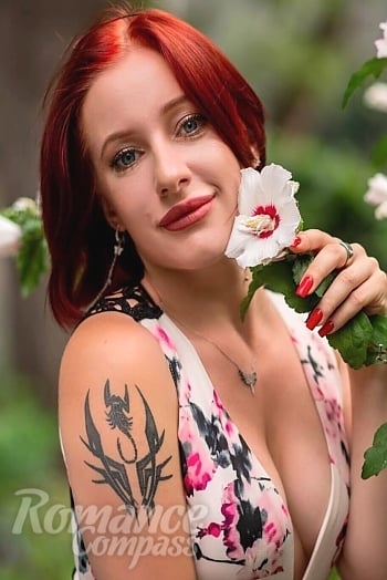 Ukrainian mail order bride Svitlana from Odesa with red hair and blue eye color - image 1