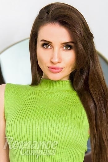 Ukrainian mail order bride Olga from Kyiv with light brown hair and hazel eye color - image 1