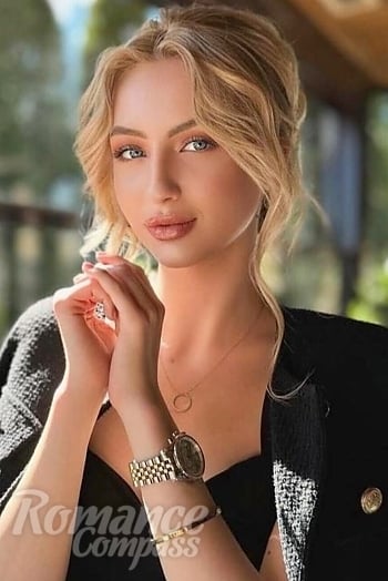 Ukrainian mail order bride Yuliia from Ternopil with blonde hair and blue eye color - image 1