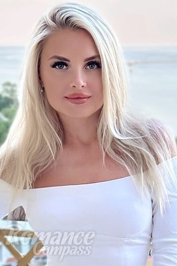 Ukrainian mail order bride Diana from Kyiv with blonde hair and green eye color - image 1