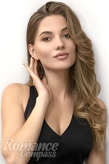 Ukrainian mail order bride Kristina from Kyiv with light brown hair and brown eye color - image 1
