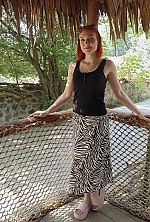 Ukrainian mail order bride Maina from Mykolaiv with red hair and green eye color - image 8