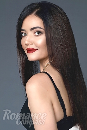 Ukrainian mail order bride Ekaterina from Kyiv with black hair and green eye color - image 1