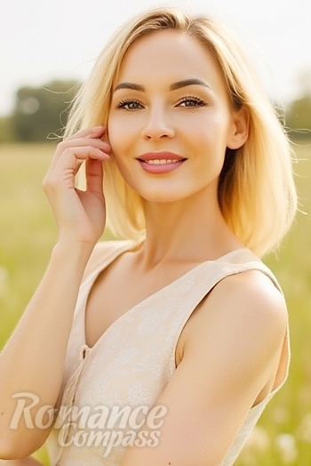 Ukrainian mail order bride Yulia from Sumy with blonde hair and grey eye color - image 1