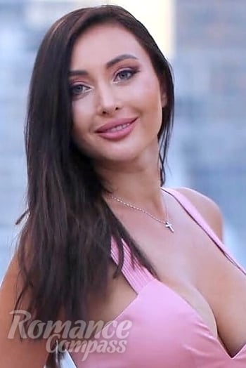 Ukrainian mail order bride Tanya from Kyiv with brunette hair and green eye color - image 1