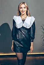 Ukrainian mail order bride Victoria from Chernivtsi with light brown hair and green eye color - image 7