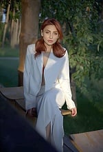 Ukrainian mail order bride Roksolana from Kyiv with auburn hair and green eye color - image 8