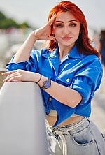 Ukrainian mail order bride Roksolana from Kyiv with auburn hair and green eye color - image 10