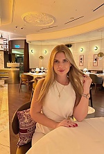 Ukrainian mail order bride Alina from Dubai with light brown hair and brown eye color - image 11