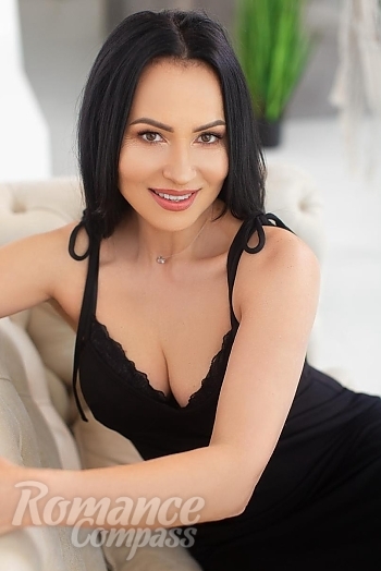 Ukrainian mail order bride Ekaterina from Kyiv with black hair and brown eye color - image 1