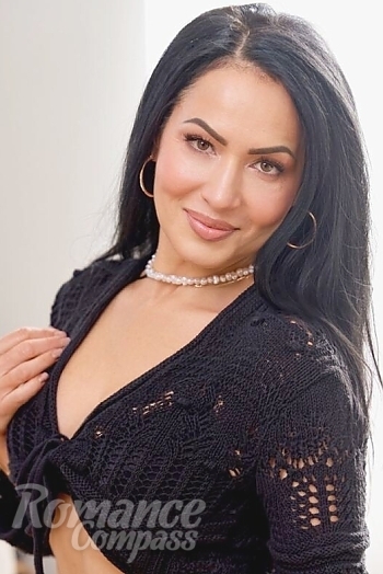 Ukrainian mail order bride Ekaterina from Kyiv with black hair and brown eye color - image 1