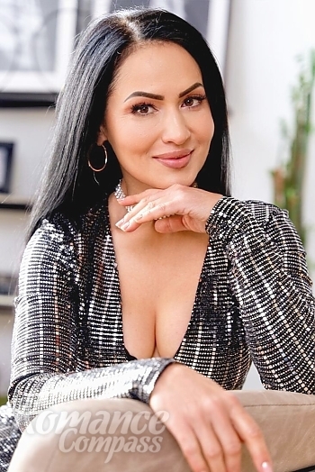 Ukrainian mail order bride Ekaterina from Kyiv with black hair and brown eye color - image 1