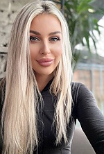Ukrainian mail order bride Olga from Kryvyi Rih with blonde hair and blue eye color - image 8