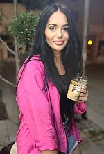 Ukrainian mail order bride Anna from Bucharest with black hair and green eye color - image 9