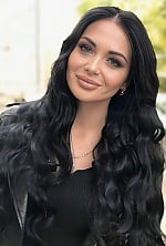 Ukrainian mail order bride Anna from Bucharest with black hair and green eye color - image 2