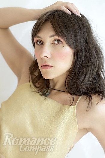 Ukrainian mail order bride Olga from Kremenchug with light brown hair and brown eye color - image 1