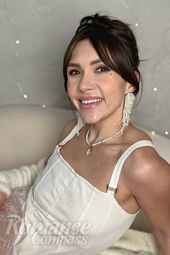 Ukrainian mail order bride Olga from Kremenchug with light brown hair and brown eye color - image 1