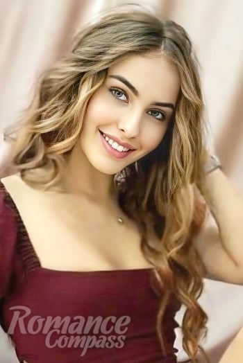 Ukrainian mail order bride Varvara from Berlin with light brown hair and blue eye color - image 1