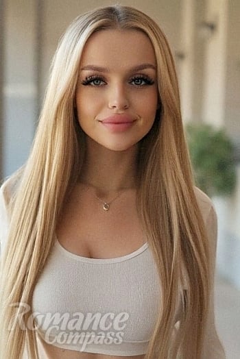 Ukrainian mail order bride Kristina from Kyiv with blonde hair and green eye color - image 1