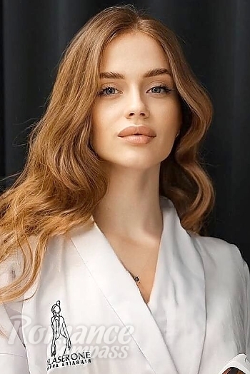 Ukrainian mail order bride Yevheniia from Kryvyi Rih with light brown hair and blue eye color - image 1