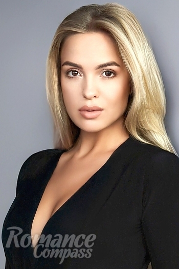 Ukrainian mail order bride Ekaterina from Kyiv with blonde hair and brown eye color - image 1