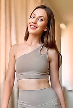 Ukrainian mail order bride Anastasia from Kyiv with light brown hair and blue eye color - image 5