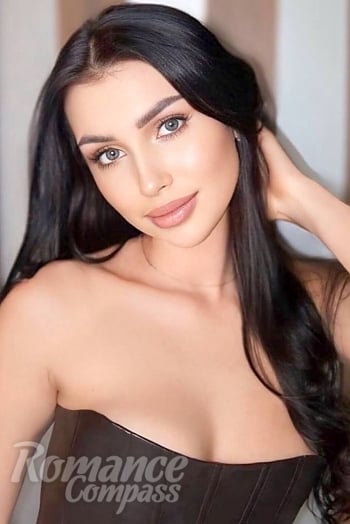 Ukrainian mail order bride Iryna from Rivne with black hair and blue eye color - image 1