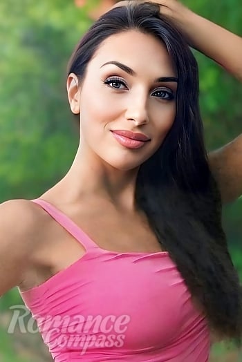 Ukrainian mail order bride Suzanne from Copenhagen with black hair and brown eye color - image 1