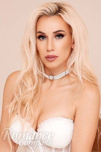 Ukrainian mail order bride Tanya from Kyiv with blonde hair and green eye color - image 1