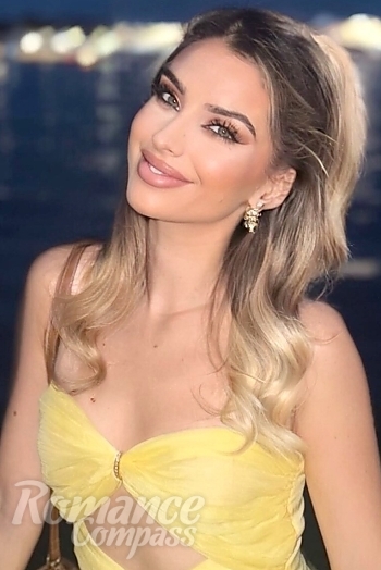 Ukrainian mail order bride Claudia from Barcelona with blonde hair and blue eye color - image 1