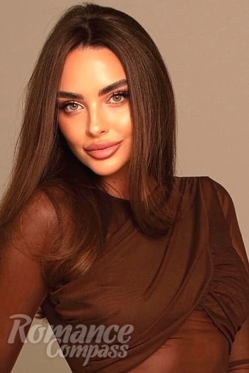 Ukrainian mail order bride Karyna from Kyiv with light brown hair and green eye color - image 1