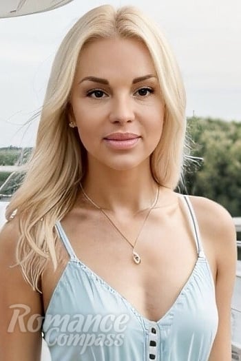 Ukrainian mail order bride Svetlana from Rome with blonde hair and brown eye color - image 1