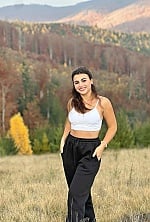 Ukrainian mail order bride Bohdana from Lviv with auburn hair and brown eye color - image 7