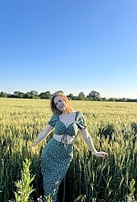 Ukrainian mail order bride Alona from Kyiv with red hair and green eye color - image 5