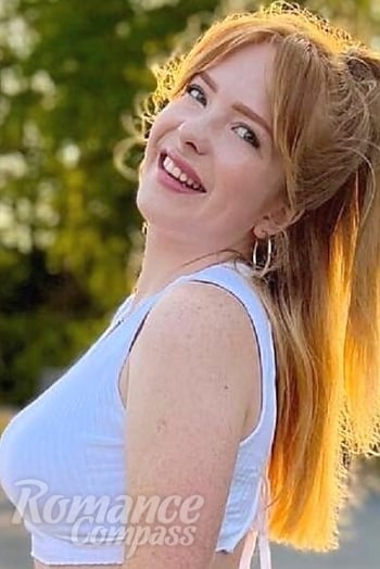 Ukrainian mail order bride Alona from Kyiv with red hair and green eye color - image 1