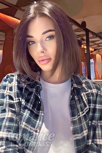 Ukrainian mail order bride Viktoriia from Kyiv with brunette hair and grey eye color - image 1