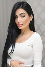 Ukrainian mail order bride Olena from Toronto with black hair and green eye color - image 2