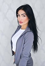 Ukrainian mail order bride Olena from Toronto with black hair and green eye color - image 3