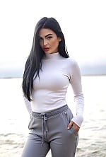 Ukrainian mail order bride Olena from Toronto with black hair and green eye color - image 10
