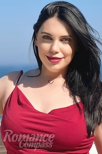 Ukrainian mail order bride Yulia from Pivdenne with brunette hair and green eye color - image 1