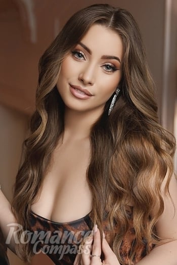 Ukrainian mail order bride Olha from Lviv with blonde hair and green eye color - image 1