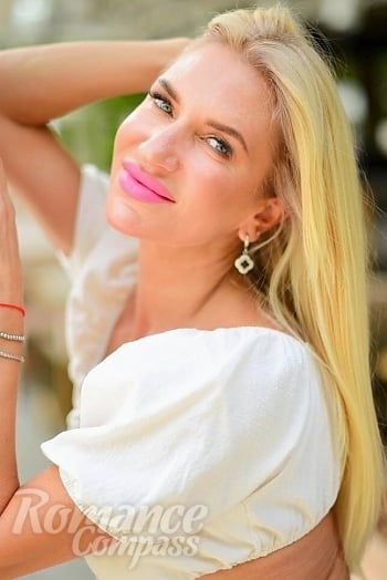 Ukrainian mail order bride Natalia from Odesa with blonde hair and grey eye color - image 1