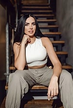 Ukrainian mail order bride Nadezhda from Kyiv with black hair and green eye color - image 5