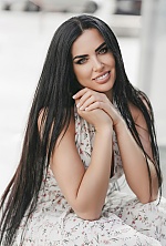 Ukrainian mail order bride Nadezhda from Kyiv with black hair and green eye color - image 11